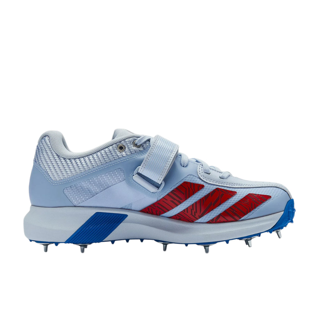 Side profile view of Adidas adiPower Victor Incurza Cricket Shoes with red stripes and metal spikes at Alberta Cricket Store.