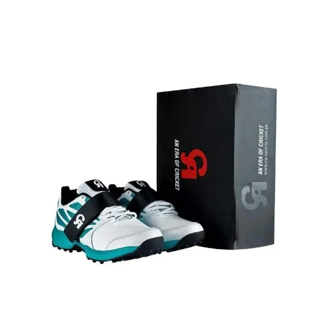 CA Big Bang Max cricket shoes in white and teal placed next to their original black CA Sports packaging box
