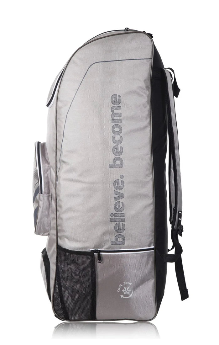 Side angle view of a grey SG Ashes cricket duffle bag from Albertacricketstore.com, showing the zippered bottom pocket, mesh bottle holder, and backpack straps.