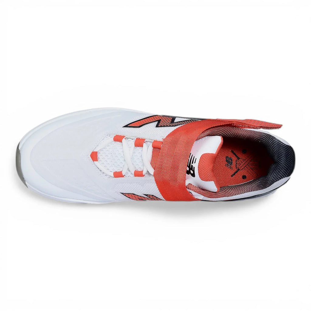 Top-down overhead view of New Balance CK4040 F7 cricket shoe in white with red midfoot strap and dark grey lining