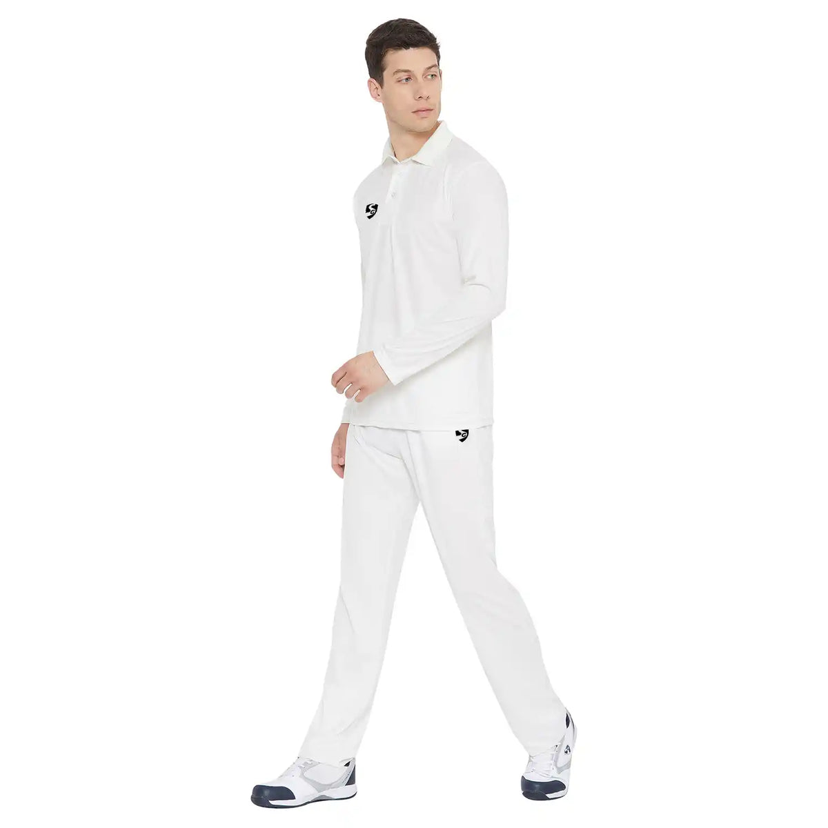 Side angle of a male model walking in SG Club full sleeve combo cricket whites shirt and trousers.