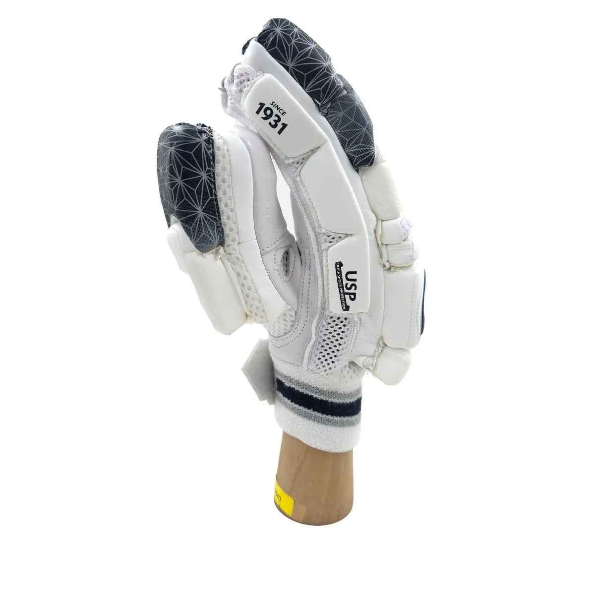 Side profile view of SG Hilite 2.0 adult cricket batting glove showing white side finger padding and thumb protection on a wooden display stand.