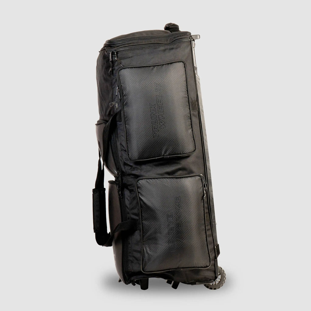 Upright black SG KLR Wheelie Trunk cricket kit bag featuring multiple zipped compartments, side pockets, and durable wheels.