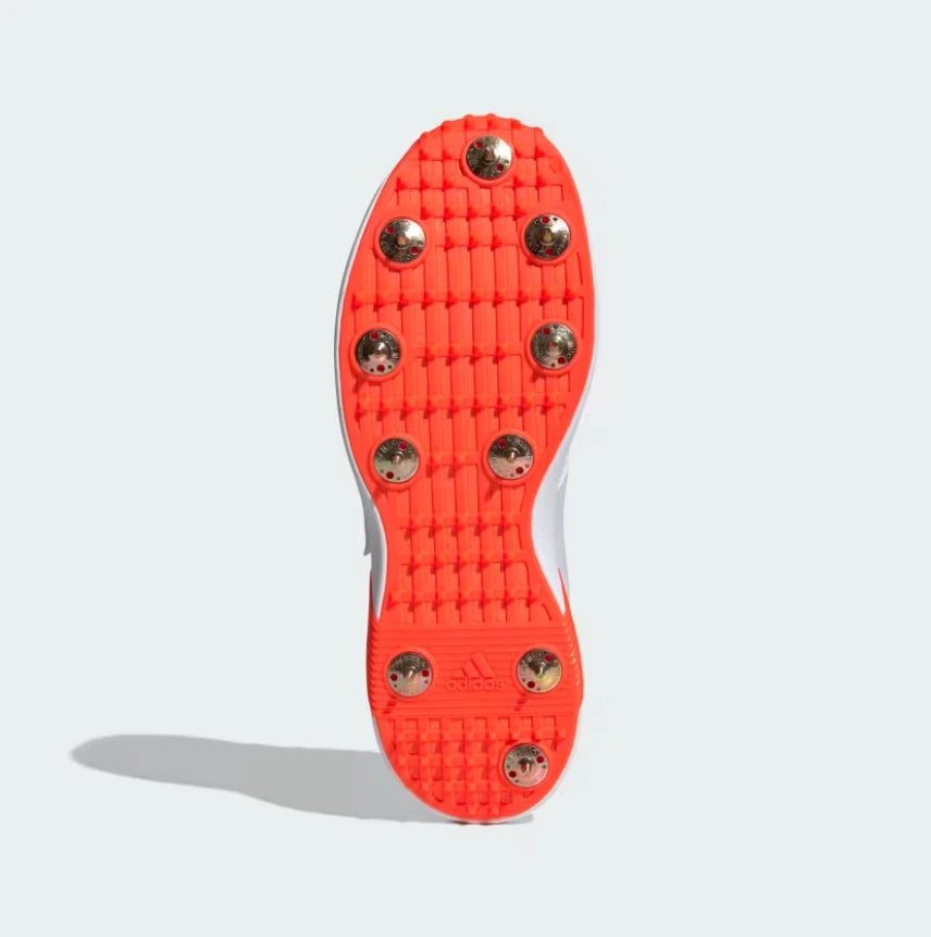 Orange outsole and metal spike configuration of Adidas Adipower Vector 2.0 Cricket Shoes - Alberta Cricket Store