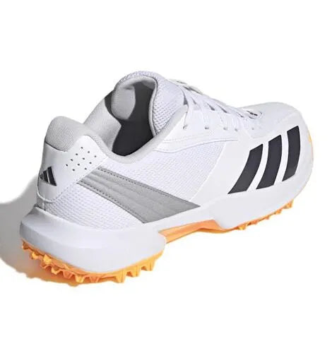 Rear three-quarter angled view of the white Adidas 22YDS Spikeless Cricket Shoe showcasing the padded ankle collar and silver-grey heel support overlay.