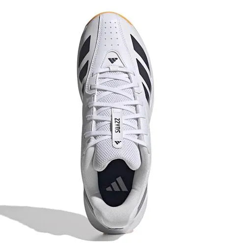 Top view of a white Adidas 22YDS cricket shoe showing the laces, tongue and black stripes.