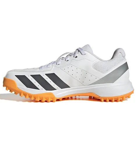 Adidas Howzat Spikeless Cricket Shoes in white and grey with orange sole at Alberta Cricket Store Canada
