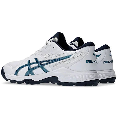 Side profile of Asics Gel-Peake 2 cricket shoes in white and navy blue featuring the signature Asics stripes.