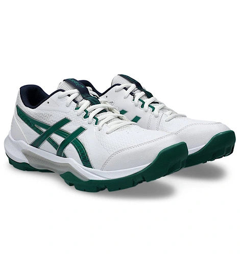 Pair of white and dark green Asics Gel-Peake 3 cricket shoes for turf and rubber-cleated traction