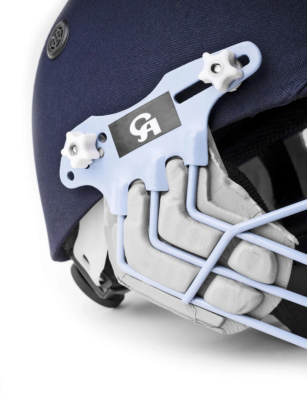 Close up of molded ear guard and steel face grille screw attachment on CA PLUS 8000 cricket helmet - Alberta Cricket Store