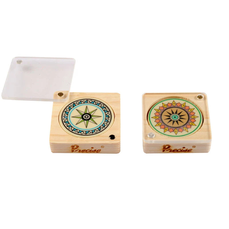 Precise tournament carrom board striker with detailed circular star pattern in a wooden protective case