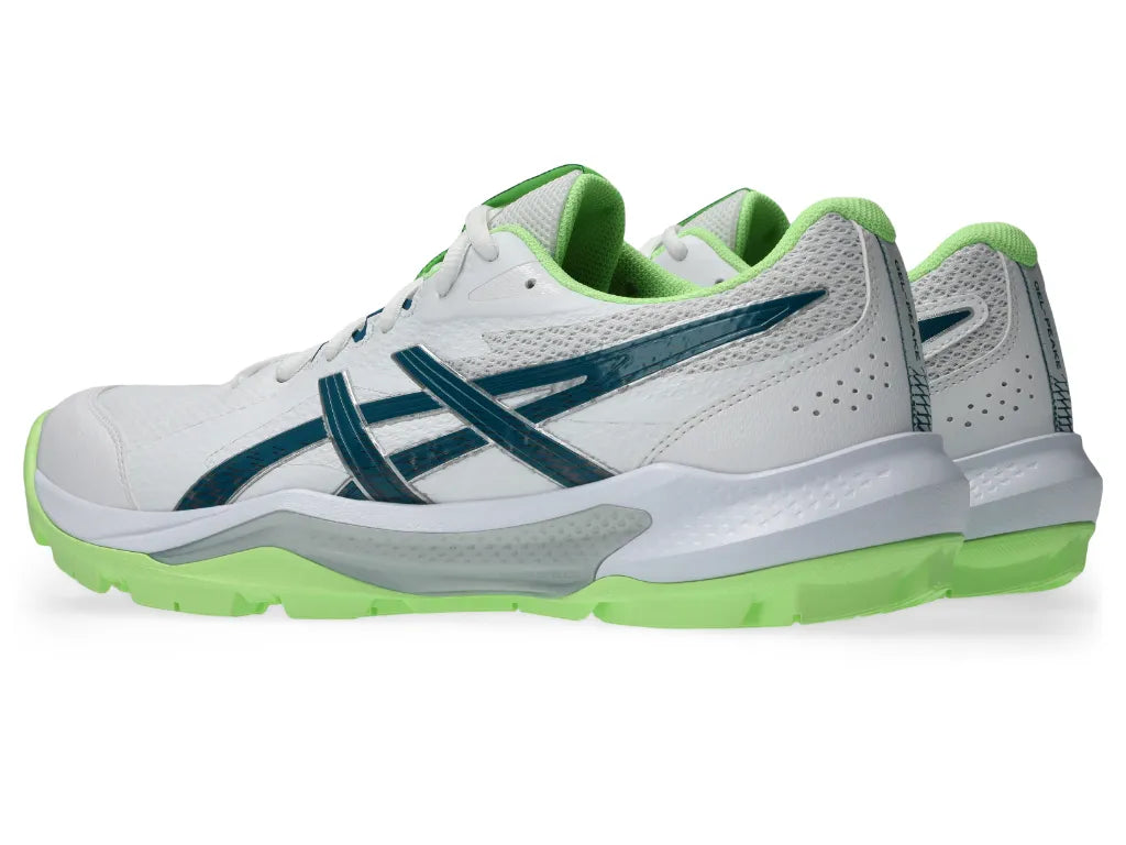 Pair of Asics Gel-Peake 3 cricket shoes in white and dark teal with vibrant lime green outsoles and ankle collars shown from a three-quarter angle.