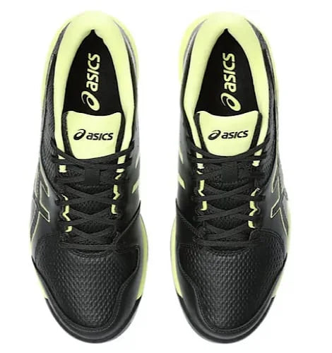 Top-down view of black Asics Gel-Peake 2 cricket shoes with neon lime inner lining and black laces.