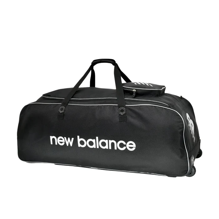 Side view of New Balance 8i wheelie cricket bag in black with white text logo on a white background on Alberta.