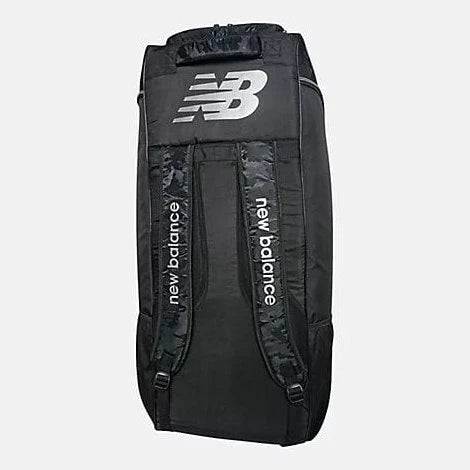 Side angle view of New Balance Pro Players duffle cricket bag in black with white NB logo on Alberta.