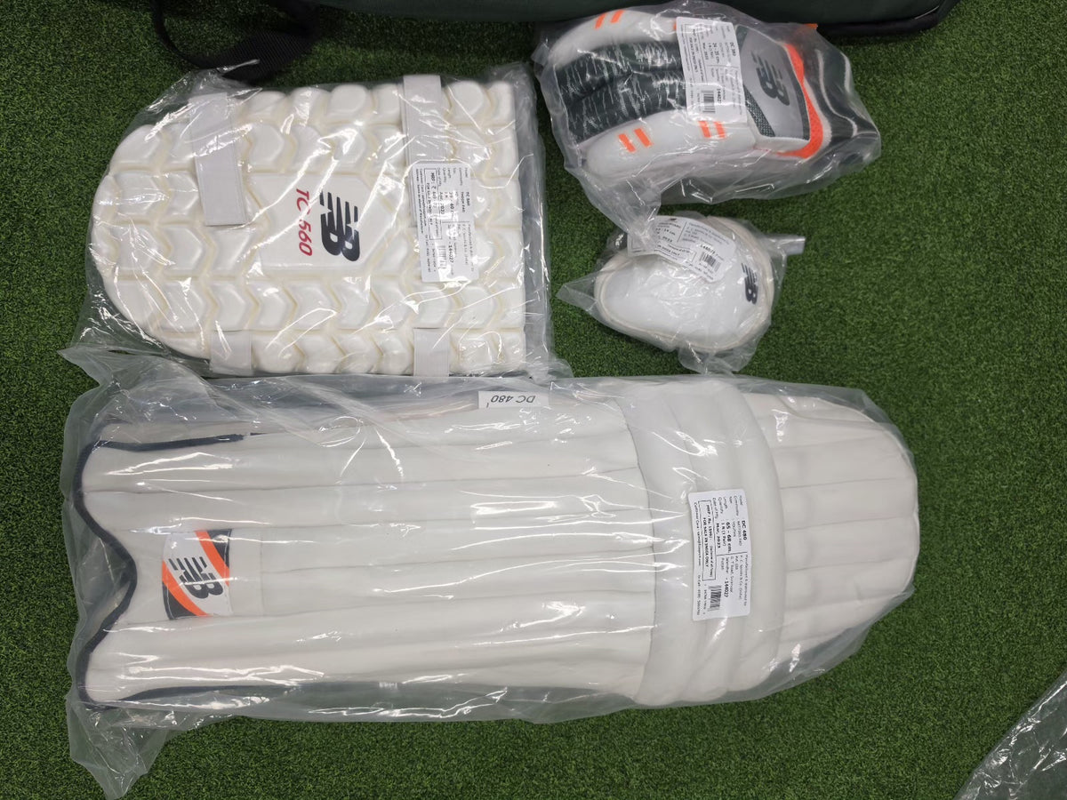 New Balance junior cricket batting pads and TC 560 thigh pad set