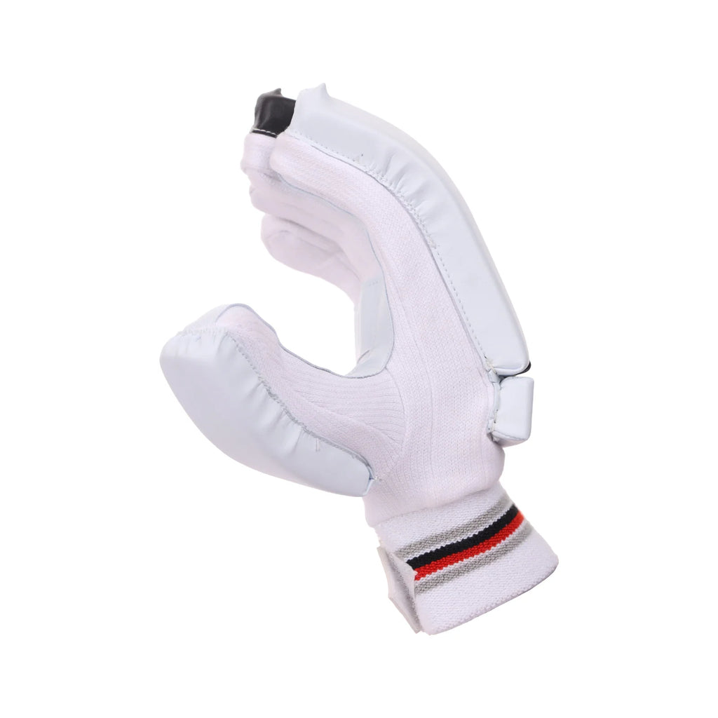 Thumb-side view of a white SG Blaze Lite junior batting glove with a red and black striped cuff.
