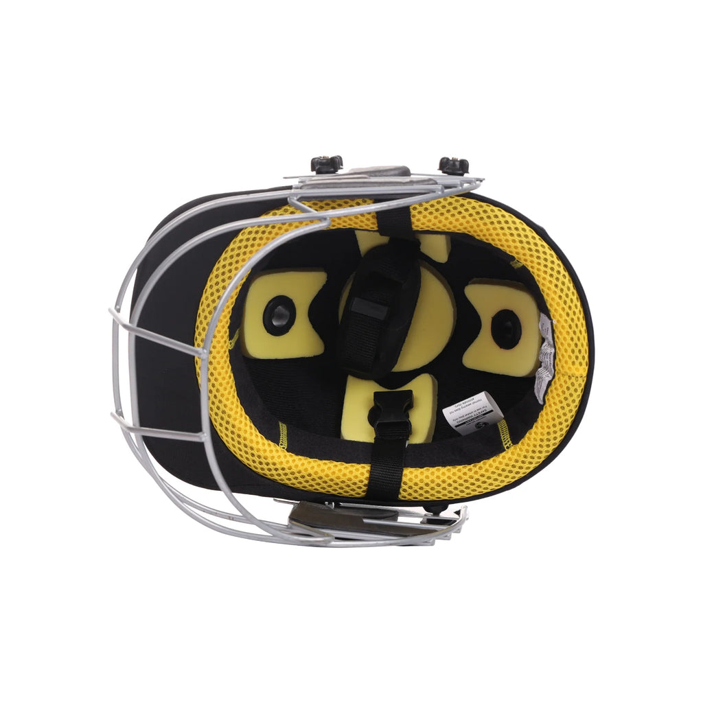 Interior view of the black SG Blazetech cricket helmet showing yellow padding, chin straps and silver faceguard.