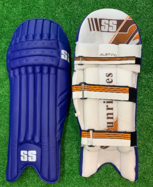Blue SS Platino batting pads showing the front and white inner padding side by side on green turf.